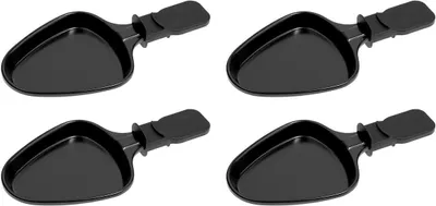 Four black raclette pans arranged in a two-by-two grid on a white background.