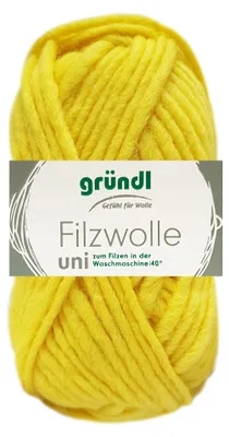 A ball of yellow yarn with a label.