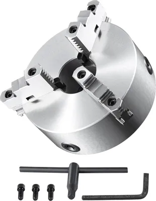 A three-jaw self-centering lathe chuck with its accessories, including a T-handle wrench, screws, and an Allen wrench, displayed against a white background.