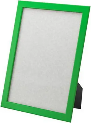 A green picture frame with a white insert, standing on a black support.