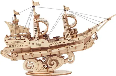 A 3D wooden model of a sailing ship on a stand.