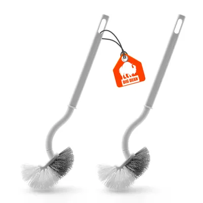 Two toilet brushes with a tag attached to one of them.