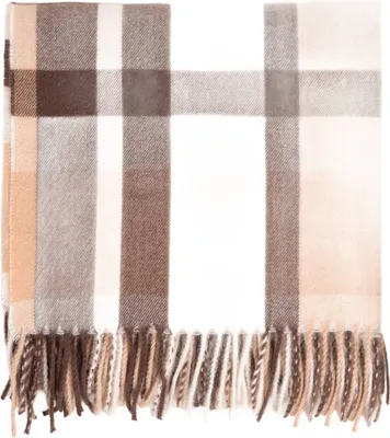 A folded plaid blanket with fringe.