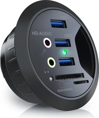 A close-up, studio shot of a black USB hub with multiple ports and card reader slots.