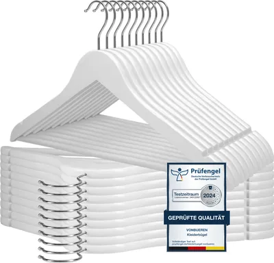 A stack of white wooden hangers with chrome hooks, with a product certification badge on the right side.