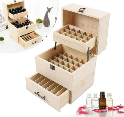 A wooden storage box with multiple compartments for essential oils or nail polish bottles.