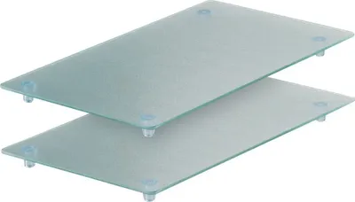 Two glass cutting boards stacked on top of each other, with clear plastic feet.