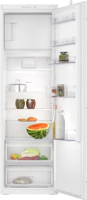 An open white refrigerator with food items inside.