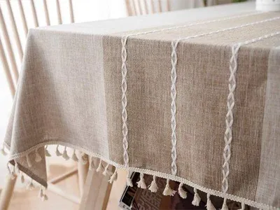 Imagen del producto de Mesa Unyqoos® con flecos – hecha a mano, 140 x 200 cm, lavable, 60% algodón/40% lino, color beige, rectangular