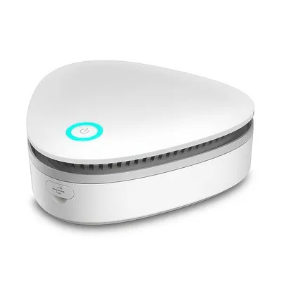 A white, modern-looking air purifier with a glowing blue power button on top.