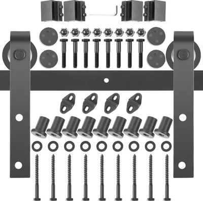 A collection of black metal sliding door hardware components laid out on a white background.