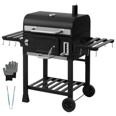 A black charcoal grill with accessories on a white background.