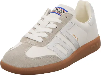 A studio shot of a single sneaker.