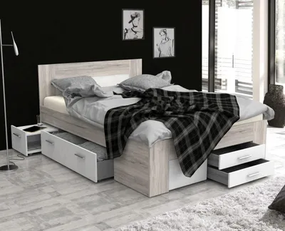 A bedroom setting with a bed and nightstand.
