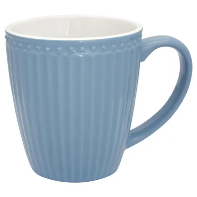A blue ceramic mug with a white interior and a ribbed texture, shown against a white background.
