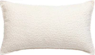 A plain, rectangular pillow with a textured, fluffy surface.