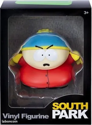 A vinyl figurine of Eric Cartman from South Park, displayed in its retail packaging.