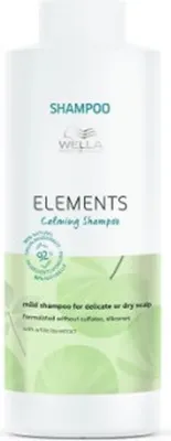 A white bottle of Wella Elements Calming Shampoo with green leaf-like graphics.