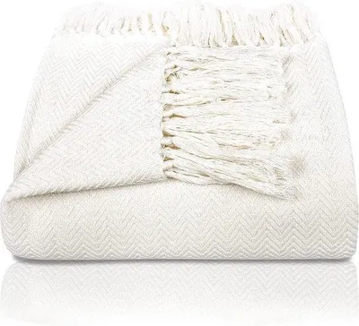 Produktbild von Famanu Tagesdecke mit Fransen - 100% Baumwolle - 150 x 200 cm - Sommerdecke mit Fischgrätmuster - Creme