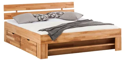 Produktbild von home24 Massivholzbett mit Bettkästen - Kernbuche Massiv