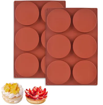 Immagine prodotto di 2 stampi in silicone rotondi, diametro 4 pollici, antiaderenti, per preparare panini per hamburger, ideali anche per torte, muffin, budini, cioccolata o sapone. Dimensioni: 33x22 cm