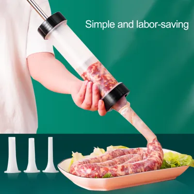 A person is using a sausage stuffer to make sausages, with three stuffing tubes and a plate of finished sausages shown below.
