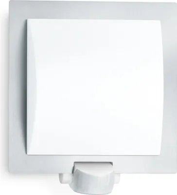 A white sensor light with a brushed metal base and a motion sensor.
