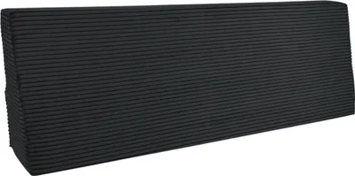 A black corduroy cushion for a pallet sofa.