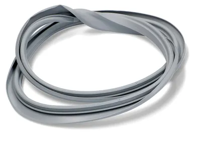 A gray rubber gasket is coiled and lying on a white background.