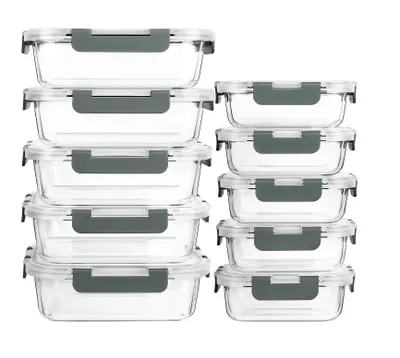 A set of glass food storage containers with gray lids, stacked in two columns.