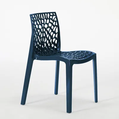 A dark blue chair with a patterned seat and backrest is shown against a white background.
