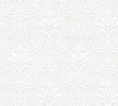 A seamless pattern of embossed white damask wallpaper.