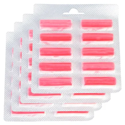 A stack of blister packs containing pink scent sticks.