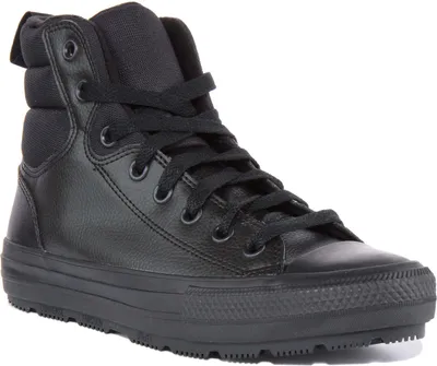 A black Converse Chuck Taylor All Star Berkshire boot is shown against a white background.
