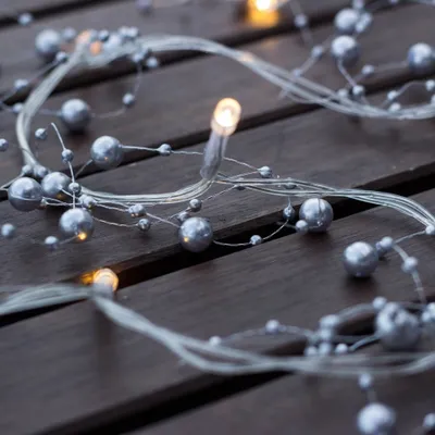 Obrázok produktu pre Svetelná reťaz LED na batérie, strieborné perly, teplá biela, 10 diód, 1,3 m