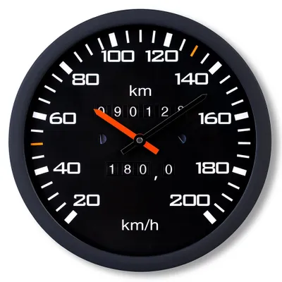 A close-up of a tachometer clock face.