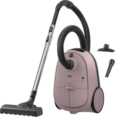 A pink AEG vacuum cleaner with its accessories displayed against a white background.