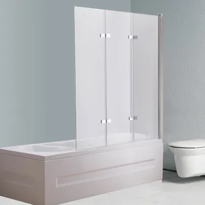 A bathroom scene with a bathtub and a toilet.