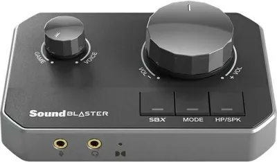 A top-down view of a black and gray audio device.