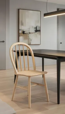 Image de Chaise ergonomique en bois pour une assise confortable dans la salle à manger