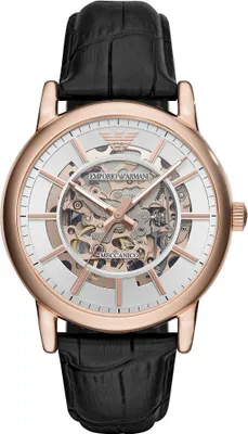 A close-up studio shot of an Emporio Armani analog watch with a skeleton dial and a black leather strap.