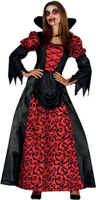 A woman is posing in a vampire costume.