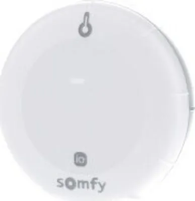 A white circular device with the Somfy logo and 'io' branding.