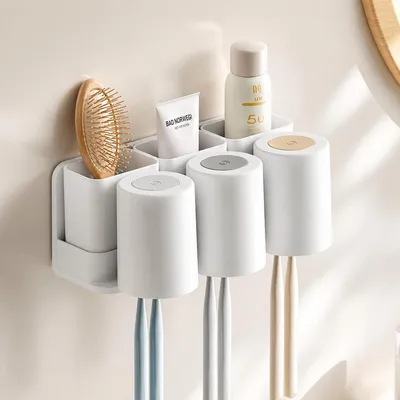 Immagine prodotto di Portaspazzolini da parete, senza necessità di foratura, con 3 contenitori, 3 scomparti, in plastica, colore bianco