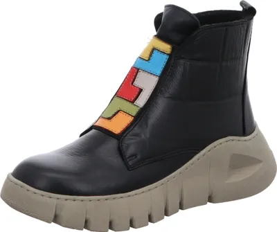A single black boot with colorful geometric accents on a white background.