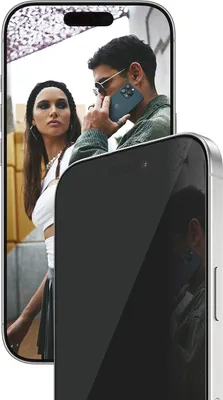 A man and a woman are shown in a close-up shot, with the man holding a phone to his ear.