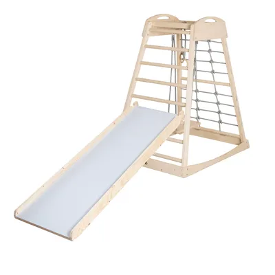 A wooden indoor play structure with a slide and climbing net, shown against a white background.