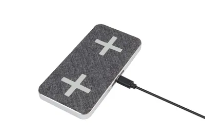 A wireless charging pad is shown on a white background.