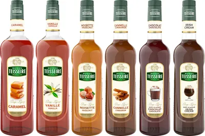 Produktbild von Sirupe für Latte und Macchiato Teiseire Cafes - Karamell, Vanille, Haselnuss, Zimt, Schokolade, Irische Creme - 5x70cl und 1x1l