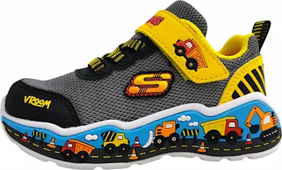 A single child's sneaker with a construction vehicle theme.
